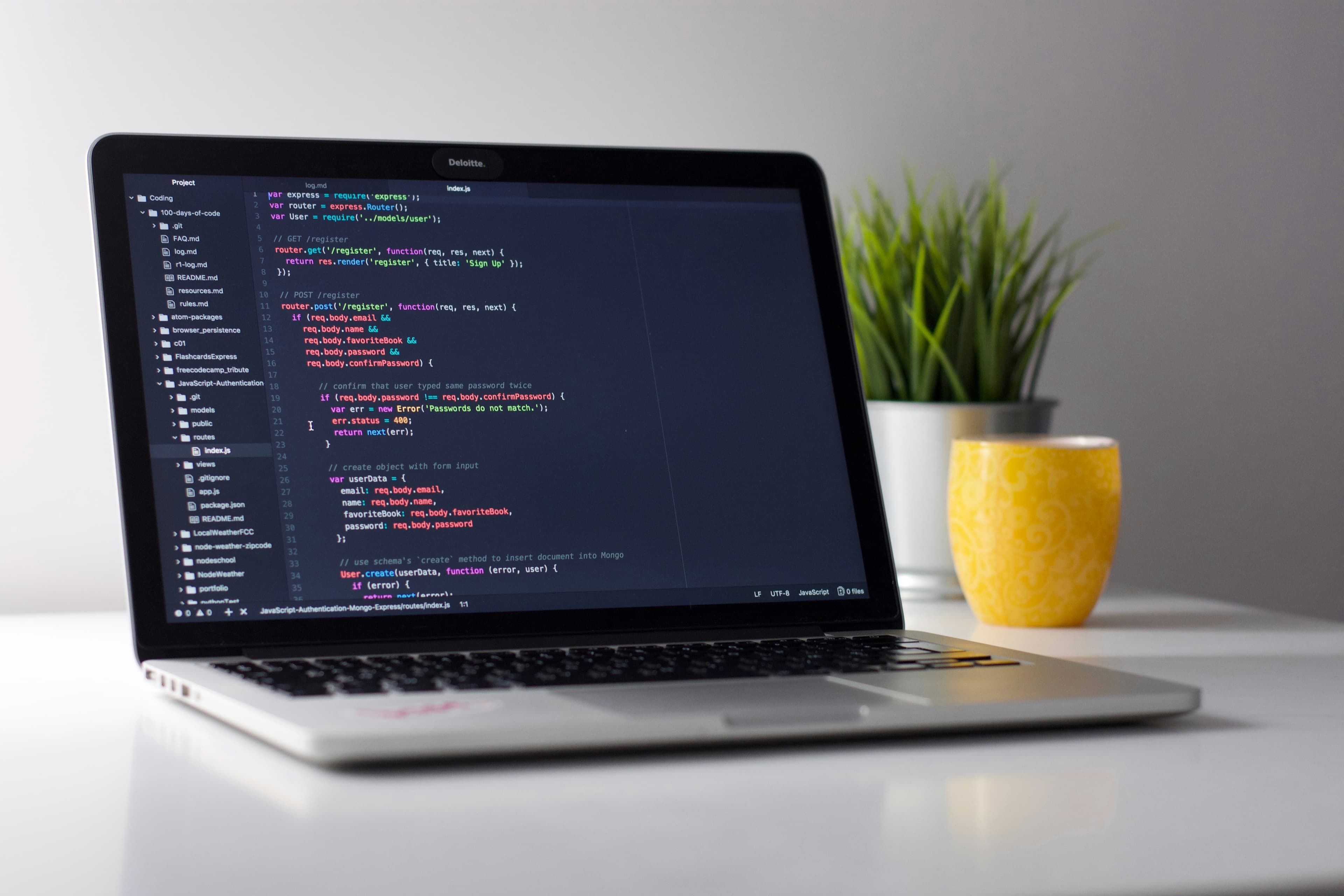 Two developer workstations side by side representing Claude Code vs Cursor comparison