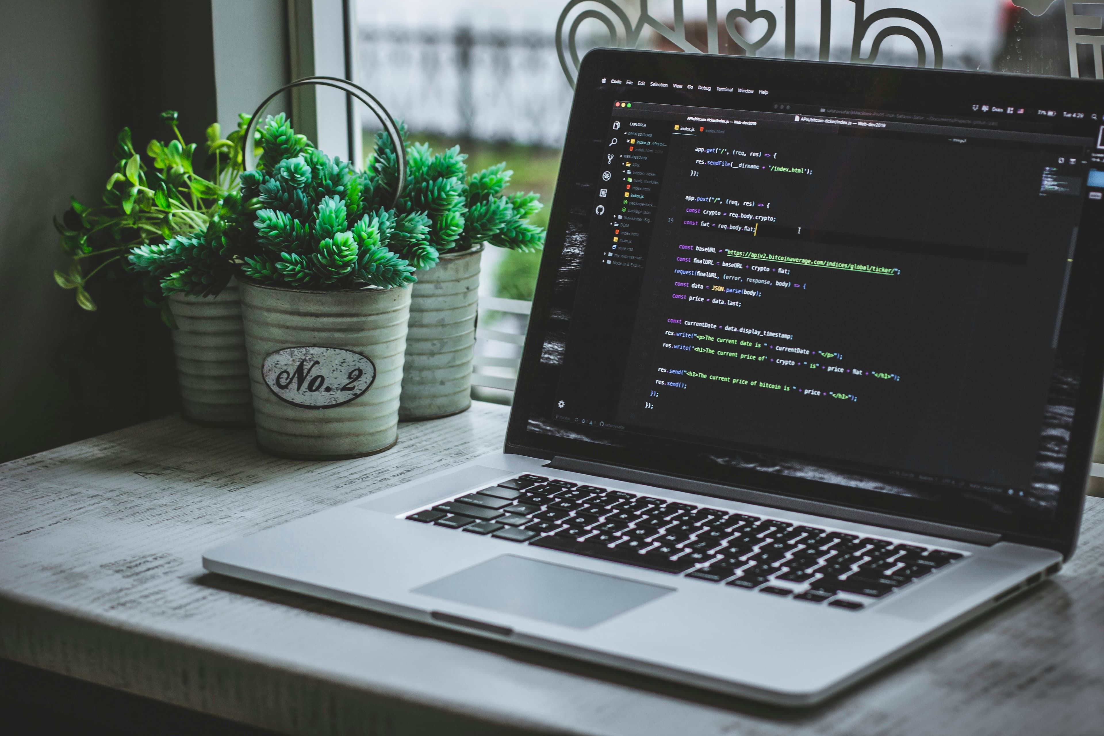 Developer building a server application with TypeScript code representing MCP server development